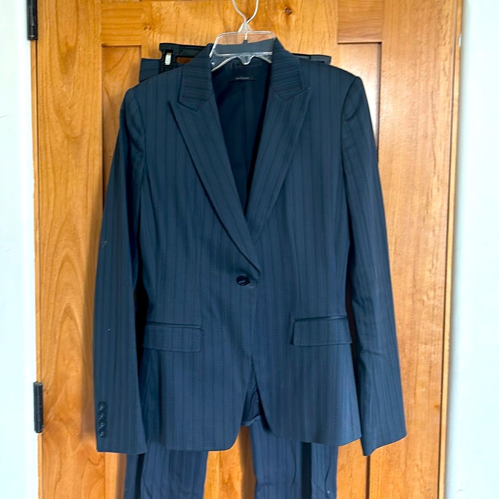 A used, but beautifully tailored Elie Tahari pantsuit.